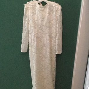 Vintage lace and pearl wedding dress.